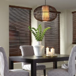 Wood blinds for dining room offered by Made in the Shade in Prescott