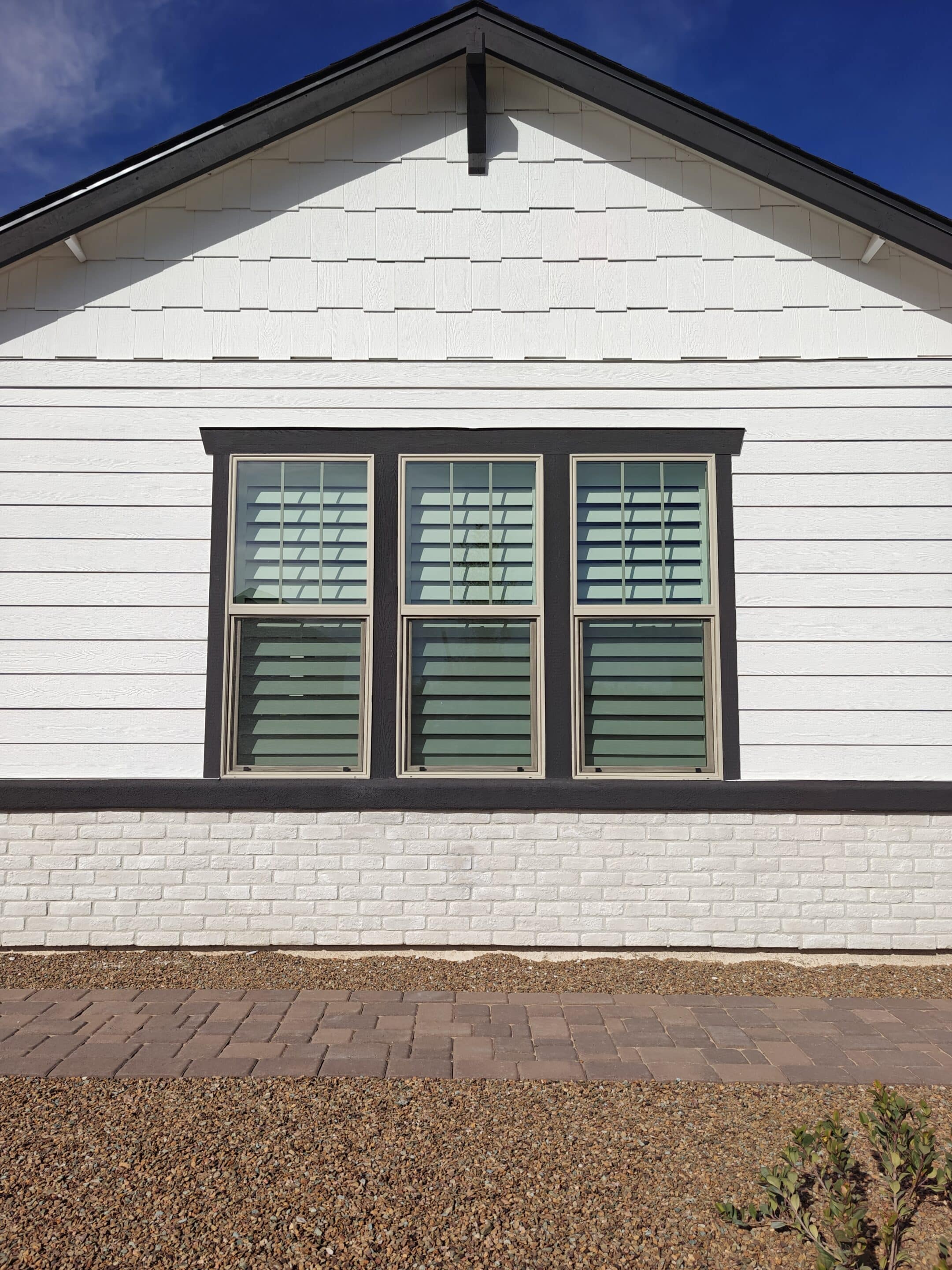 Composite white plantation shutter in Chino Valley AZ outside view from streetside.