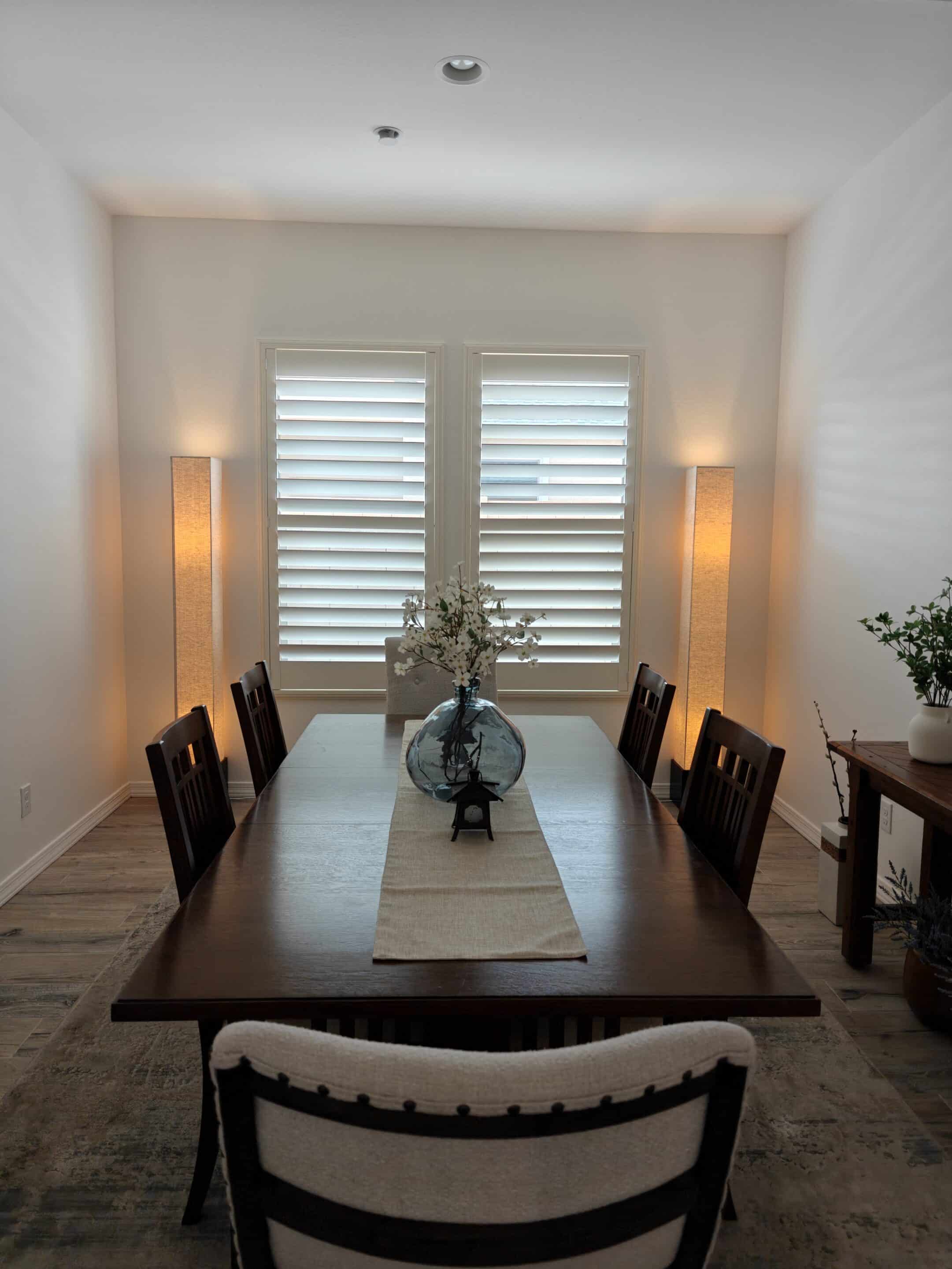 Composite white plantation shutter in Prescott AZ in a Dining Room.