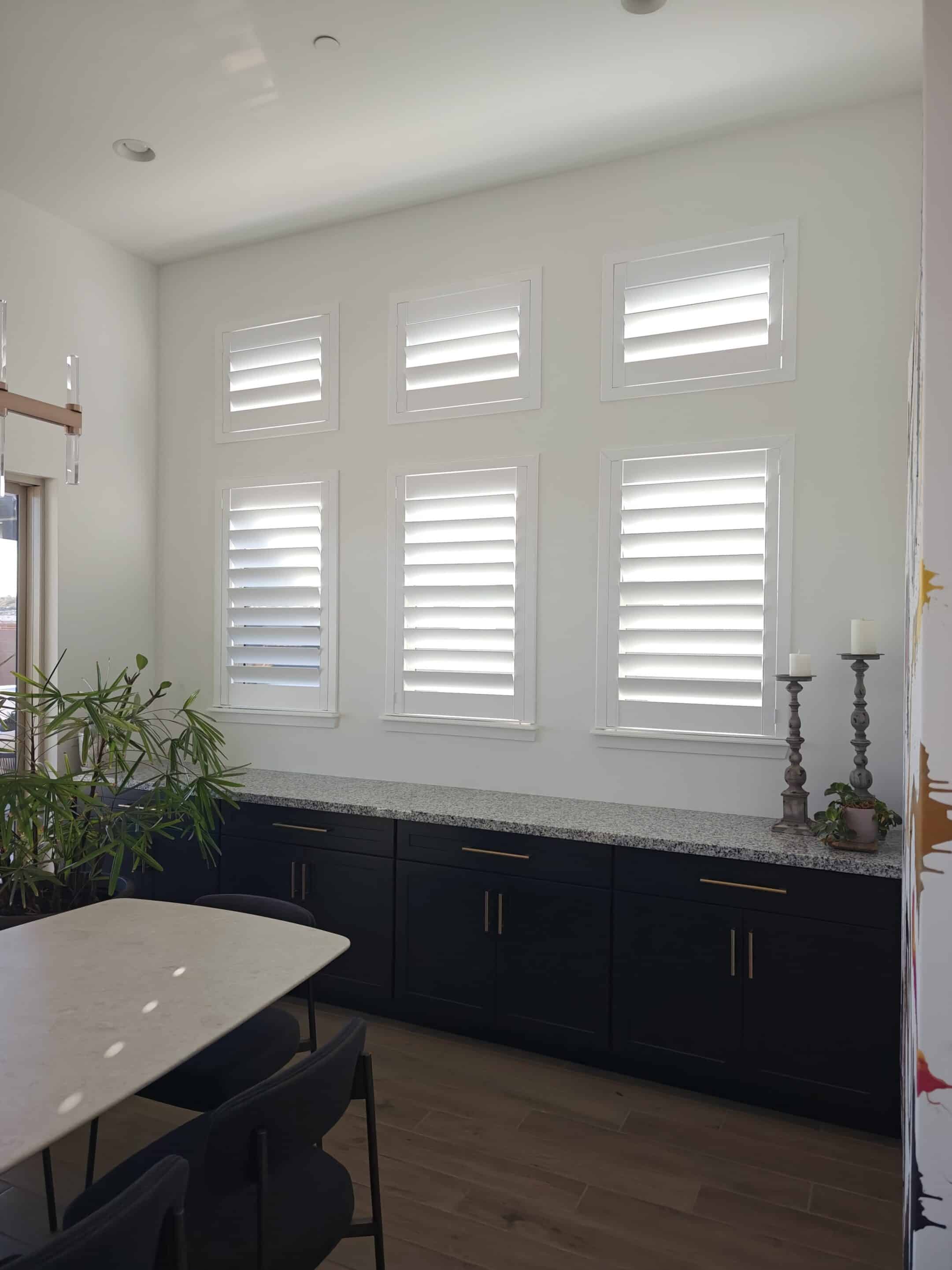 Composite white shutters in a modern home.